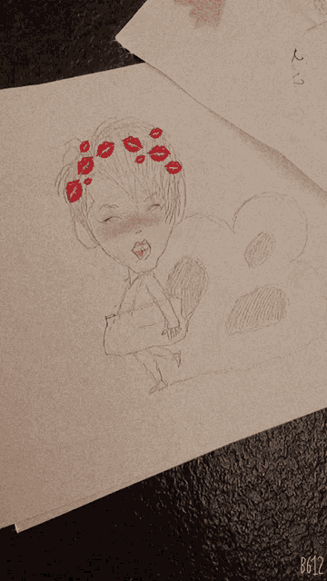 a drawing of a girl with red kisses on her head is on a piece of paper that says b612