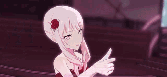 a girl in a red dress is dancing with a boy in a white coat .