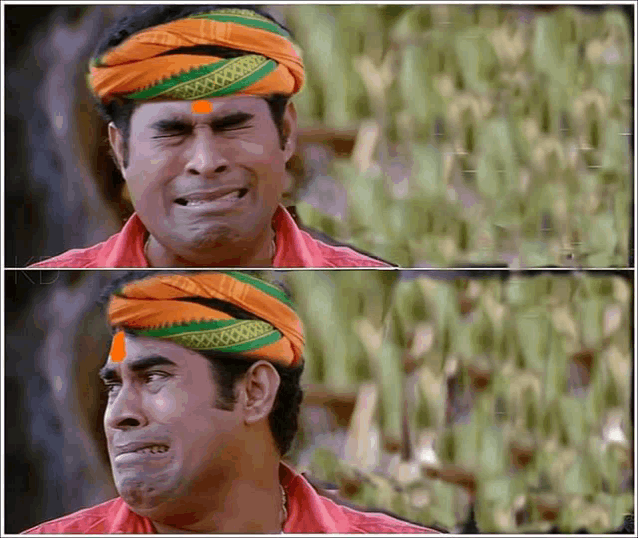 a man with a turban on his head is making a sad face