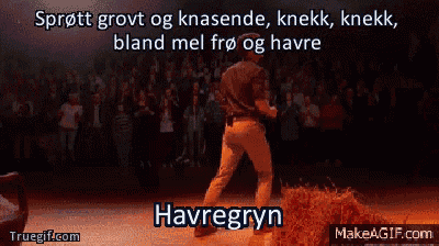 a man is dancing in front of a crowd with the words havregryn written below him