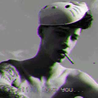 a pixelated image of a man smoking a cigarette with the words " i still love you " on the bottom