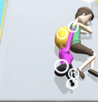a man and a woman are playing a game and the woman is holding the man 's hand