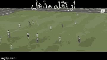 a group of soccer players are playing on a field with a qatar logo in the background