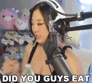 a woman is sitting in front of a microphone with the words `` did you guys eat '' above her .
