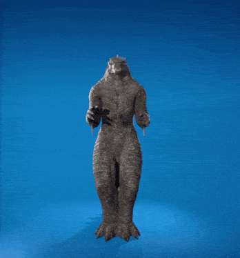 a statue of an elephant covering its face with its hands