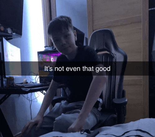 a boy sits in a chair with the words " it 's not even that good " on the bottom