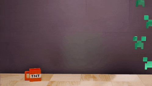 a tnt mug sits on a wooden floor next to the word hola