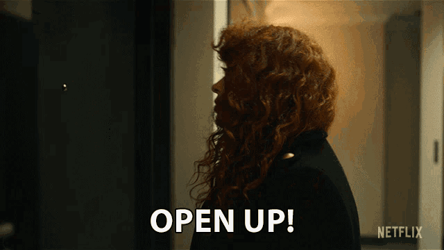 a woman with red hair says open up on a netflix ad