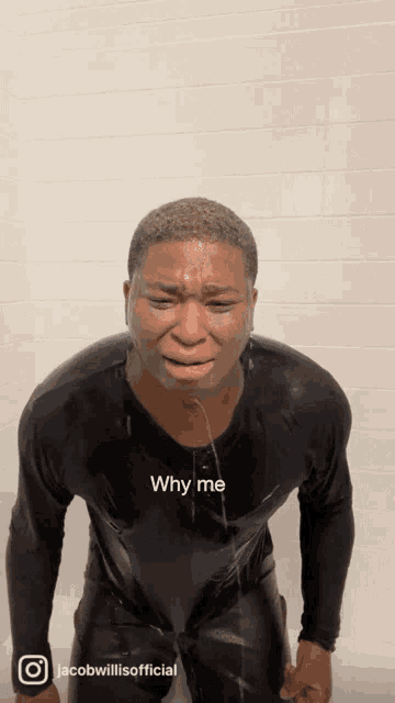 a man is standing in a bathtub with a caption that says " why me "
