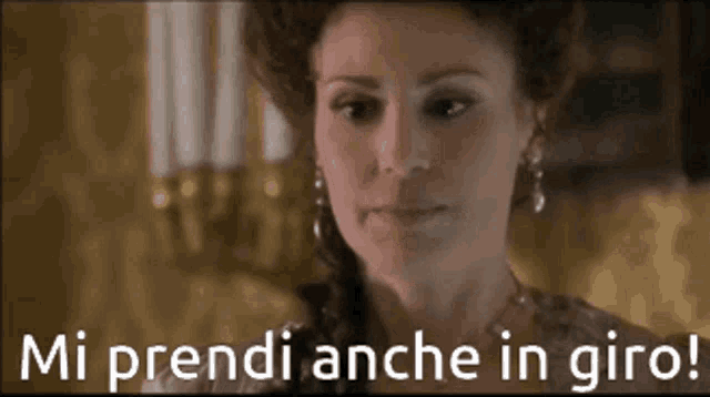 a woman says mi prendi anche in giro in a foreign language