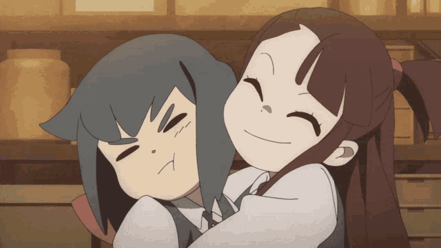 two cartoon characters are hugging each other and one of them is making a face
