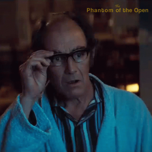 Taking Off Glasses Maurice Flitcroft GIF - Taking Off Glasses Maurice Flitcroft The Phantom Of The Open GIFs