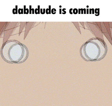 a close up of a person 's eyes with the text dabhdude is coming
