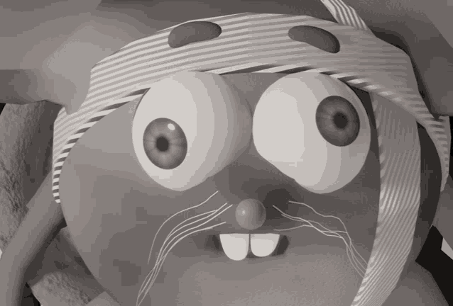 a black and white cartoon character with a bandaged head