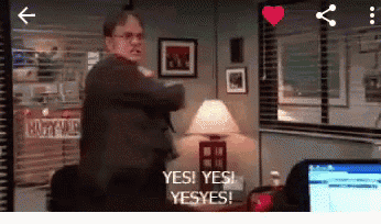 a man in a suit is standing in a room with a lamp and says yes yes yes yes