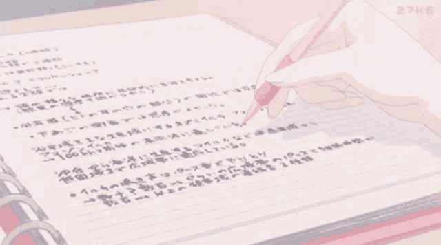 a person is writing in a notebook with the number 27kd on the bottom