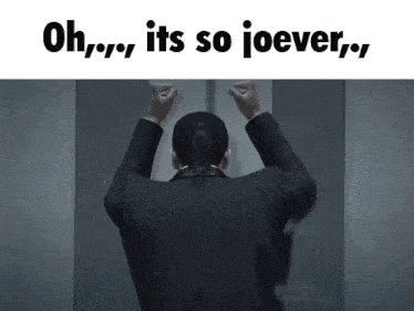 a woman in a suit is standing in an elevator with her arms in the air and the words oh its so joever written above her