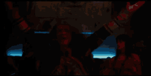a man with his arms outstretched in front of a woman