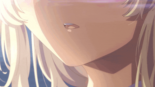 a close up of a girl 's face with a tear coming out of her nose