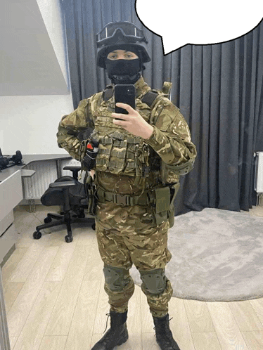 a man in a military uniform takes a selfie