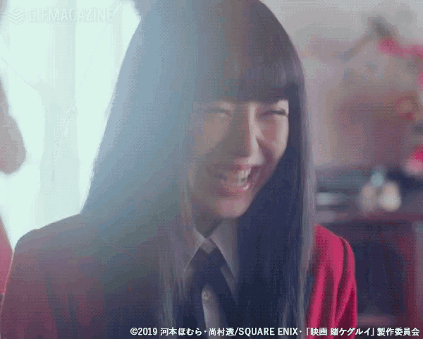 a woman in a red jacket and tie is smiling with a square enix logo below her