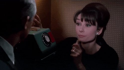 a woman is talking to a man and the words i 'm having a nervous breakdown
