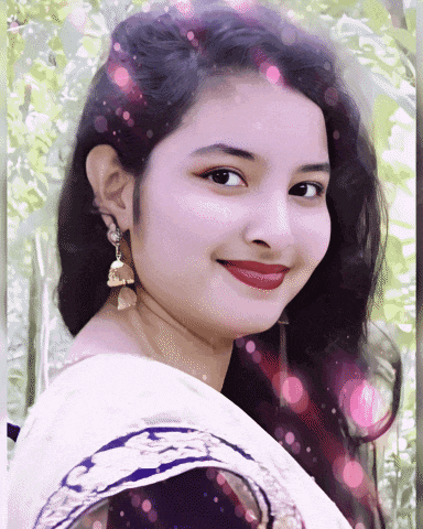 a close up of a woman 's face with a blurred background