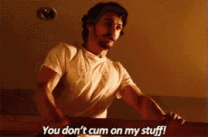 a man in a white shirt is saying you don t cum on my stuff .