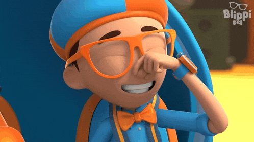 a cartoon character from blippi wipes his nose with his finger