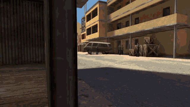 a van is parked in front of a building with boxes on the ground