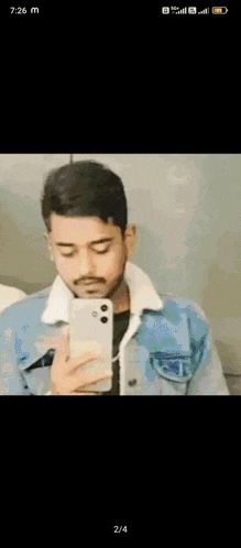 a man taking a picture of himself with the words mr unique at the top