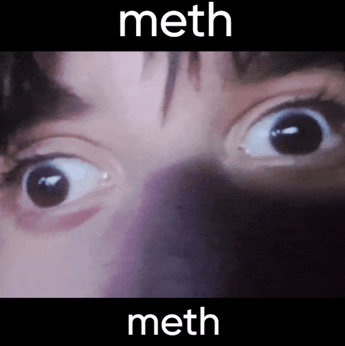 a close up of a person 's eyes with the word meth in white letters