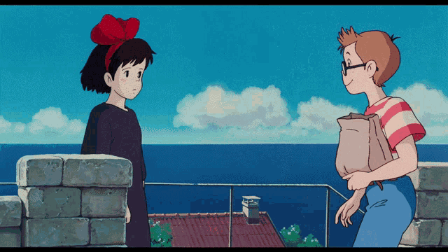 a girl with a red bow on her head stands next to a boy with glasses