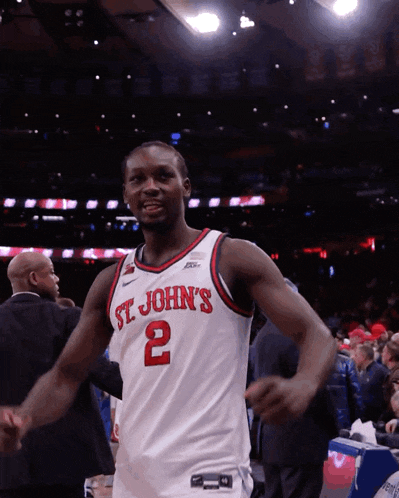 a man wearing a st john 's jersey number 2