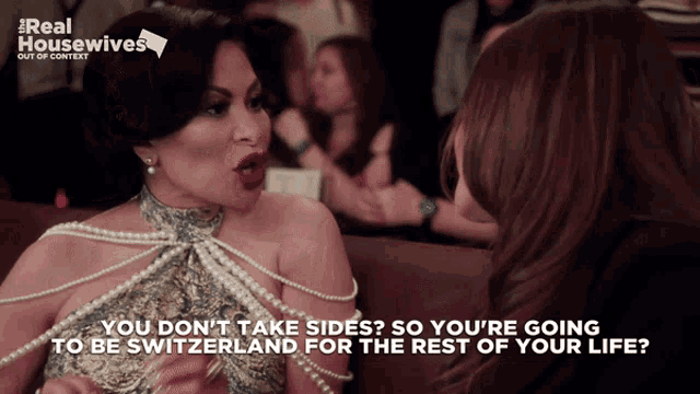 a real housewives poster with two women talking