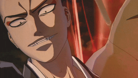 a close up of a man 's face with a very angry expression