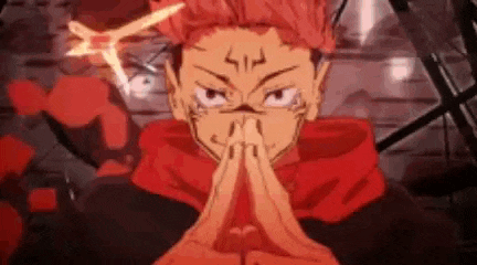 a close up of a person 's face with their hands folded in front of their face .