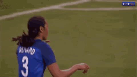 a soccer player with the number 3 on their jersey