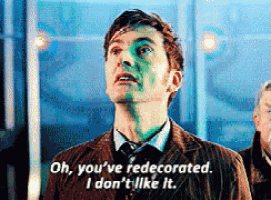 a man in a suit and tie says " oh you 've redecorated i don 't like it "