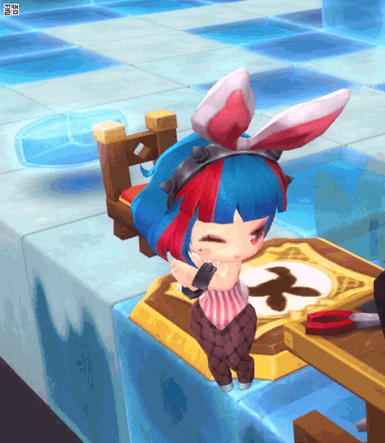 a girl with bunny ears is sitting on a table