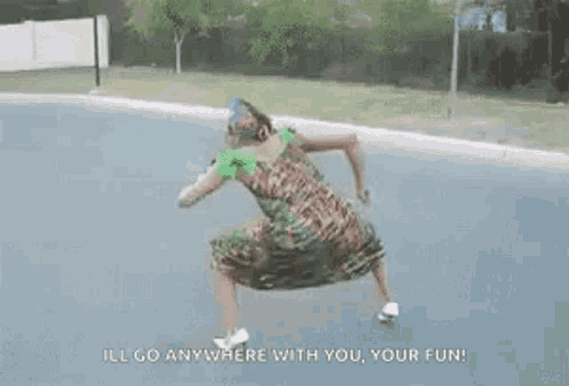 a woman in a leopard print dress is dancing on a street with the words `` ill go anywhere with you your fun '' .