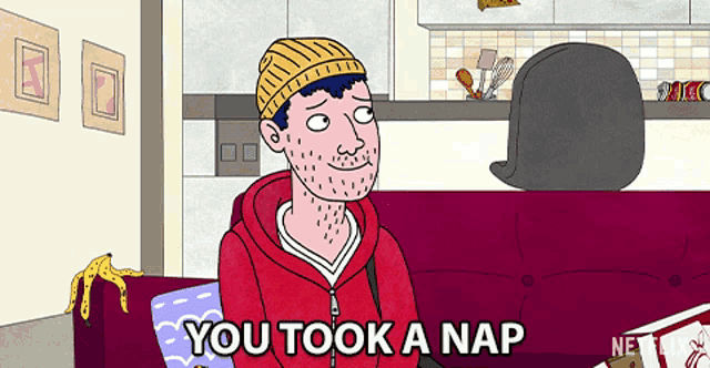 a cartoon of a man sitting on a couch with the words " you took a nap " below him