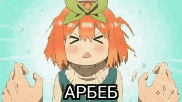 a cartoon girl with orange hair and a green bow on her head is making a face .