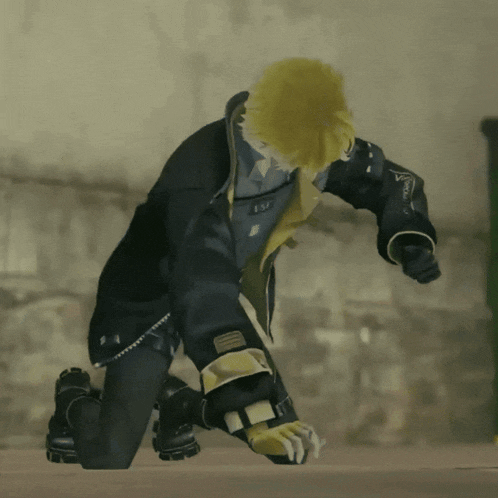 a video game character is kneeling down and has a yellow hair