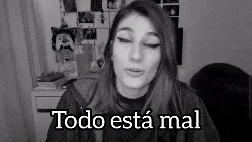 a black and white photo of a woman with the words todo esta mal above her