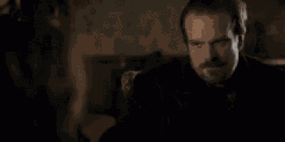a man is sitting in front of a computer screen with the words `` this whole time you were right '' .