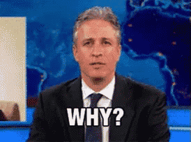 a man in a suit and tie is saying why
