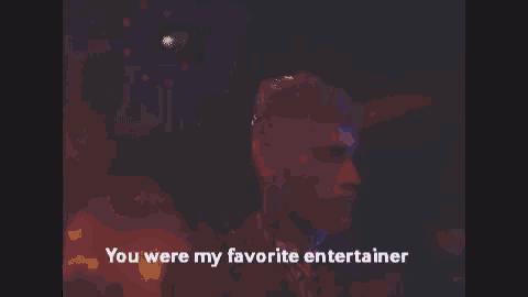 a blurred image with the words " you were my favorite entertainer " on the bottom