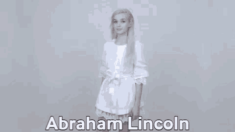 a woman in a white dress is standing in front of a white background and the words abraham lincoln are written on it .