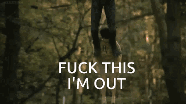 a man is hanging from a tree with a dog and the words " fuck this i 'm out " above him